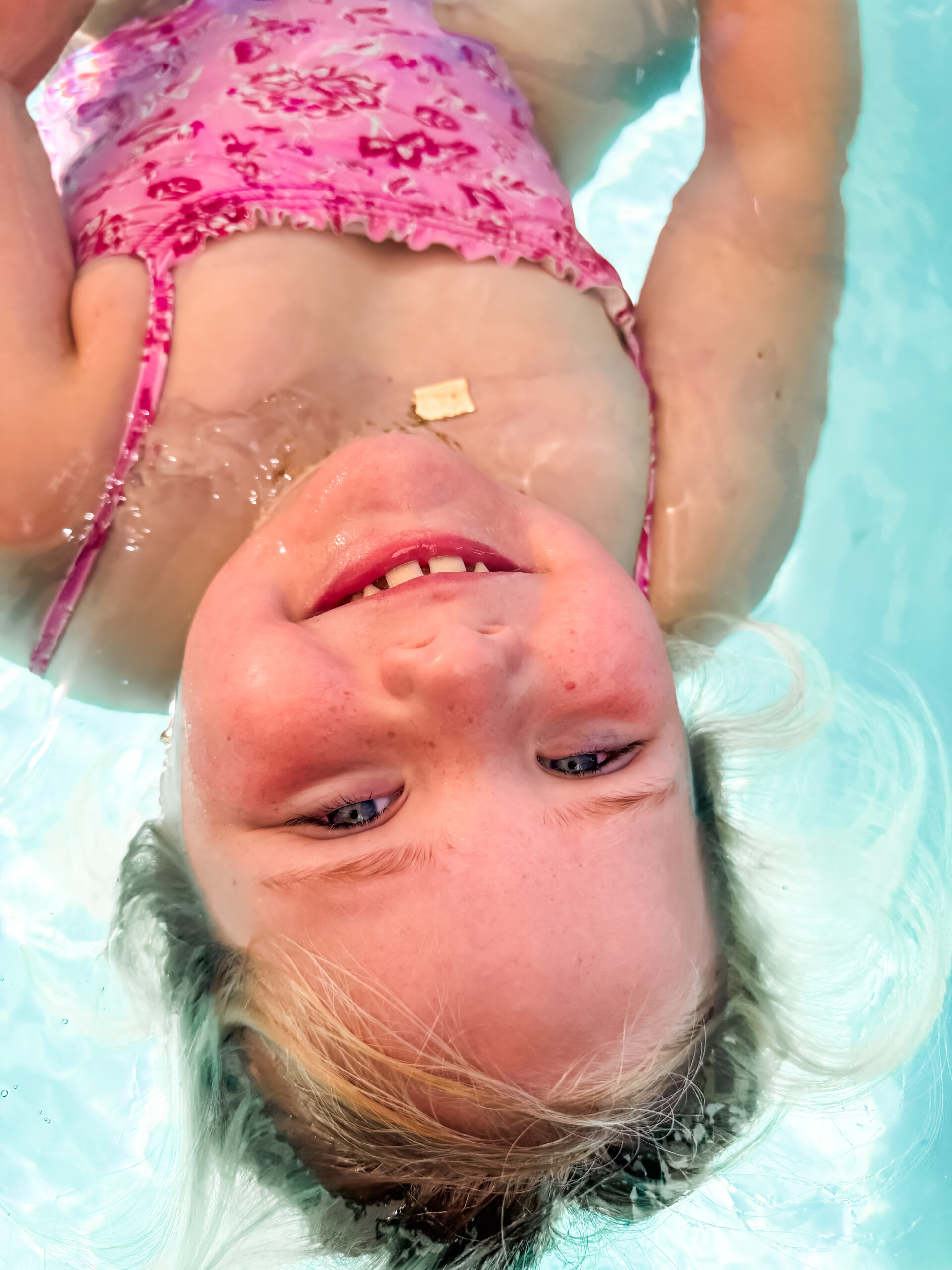 Toddler practicing Swim Float Swim survival skills in private lesson